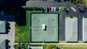 Tennis court and racquet – best tennis gifts for Wimbledon fans UK
