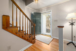Open internal door and hallway showing the architrave ledge above the door frame where a personalised door topper sits