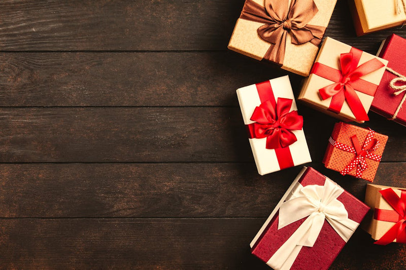 Beautiful selection of wrapped gift boxes with ribbons