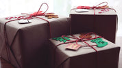 Three colourful gift boxes wrapped and ready to surprise