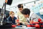 3D printer creating a custom keychain layer by layer