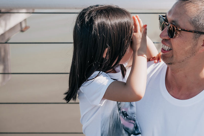 Father and daughter sharing a happy moment together