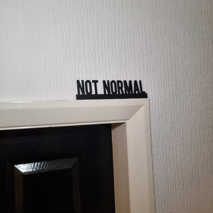 Not Normal Door Topper - Close Up Detail View