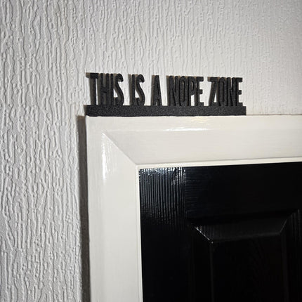 This Is A Nope Zone Door Topper - Close Up Detail View