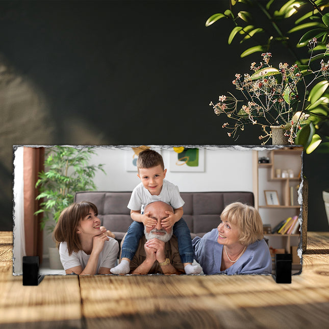 Freestanding rectangular photo slate displaying a family photograph on a wooden shelf